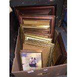 A box of pictures / photo frames. Live bidding available via our website, if you require P&P