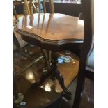 An Italian style tripod table Live bidding available via our website, if you require P&P please read