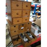 2 multi drawer woooden cabinets and contents Live bidding available via our website, if you