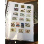 A folder of GB stamps (over 450 stamps) Live bidding available via our website, if you require P&P