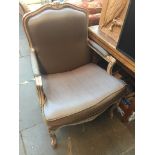 A Continental style armchair Live bidding available via our website, if you require P&P please
