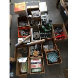 A shelf of engineering tools and lathe parts Live bidding available via our website, if you