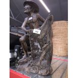 A wooden figure of oriental fisherman Live bidding available via our website, if you require P&P