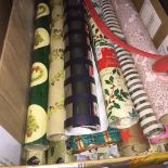 A box of wrapping paper rolls. Live bidding available via our website, if you require P&P please