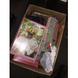 A box of boxed games, jigsaws and toy soldier figures etc Live bidding available via our website, if