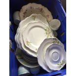 A box of pottery including Wedgwood metallised tableware and Japanese tea set Live bidding available