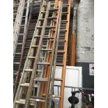 A set of wooden extending ladders Live bidding available via our website, if you require P&P