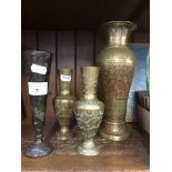 A quantity of eastern brass vases Live bidding available via our website, if you require P&P