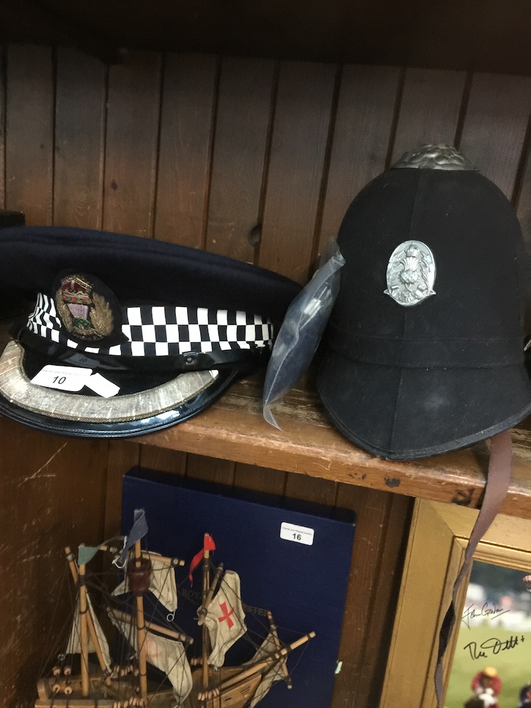 Two vintage police hats Live bidding available via our website, if you require P&P please read