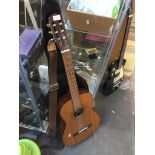 An Angelica acoustic guitar with soft case Live bidding available via our website, if you require