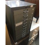 A grey metal multi drawer filing cabinet, height 68cm. Live bidding available via our website, if