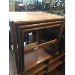 A G-Plan teak nest of tables Live bidding available via our website, if you require P&P please