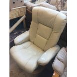 An Anderssons cream leather reclining swivel armchair and stool Live bidding available via our