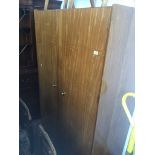 A. Younger Ltd teak wardrobe, h180cm, w122cm. Live bidding available via our website, if you require