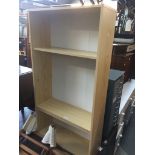 A pine effect bookcase Live bidding available via our website, if you require P&P please read