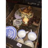 A box of mixed pottery including blue and white, teapot, brassware, wooden eggcups, candle holders
