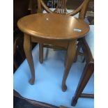 A modern round top occasional table Live bidding available via our website, if you require P&P
