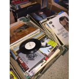 2 boxes of Lps, singles, and CDs Live bidding available via our website, if you require P&P please