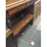 A pair of 2 drawer yew wood coffee/side tables and a low cabinet Live bidding available via our