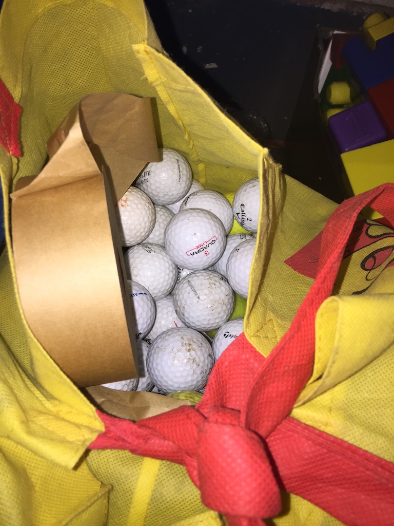 A bag of golf balls Live bidding available via our website, if you require P&P please read important