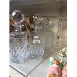 Four crystal decanters - Stuart, Brierley etc Live bidding available via our website, if you require