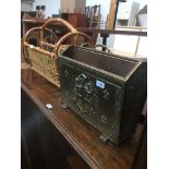 A brass bound magazine rack and a cane magazine rack Live bidding available via our website, if