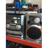 A Philips mini hifi system with speakers and record deck. Live bidding available via our website, if