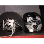 Two motorcycle crash helmets - medium and small Live bidding available via our website, if you