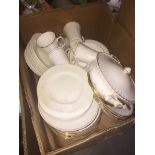 Box of white china dinner ware Live bidding available via our website, if you require P&P please
