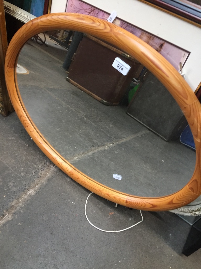 Oval pine framed mirror Live bidding available via our website, if you require P&P please read