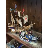 A model galleon and fishing boat Live bidding available via our website, if you require P&P please