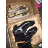 A pair of ladies leather ice skating boots and various spare blades Live bidding available via our