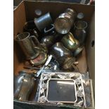 A box of metalware, pewter, brass, platedware, tankards, leather cigar case, cutlery, etc. Live