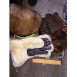 A box containing fur muff, sheepskin gloves, fur gloves etc Live bidding available via our
