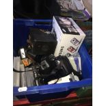 A box of cameras including Voigtlander, Minolta SLR, playstation games, etc Live bidding available