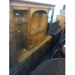 A yew wood lounge display cabinet, h184cm, w166cm, d40cm. Live bidding available via our website, if