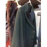 A coat and a fur stole. Live bidding available via our website, if you require P&P please read