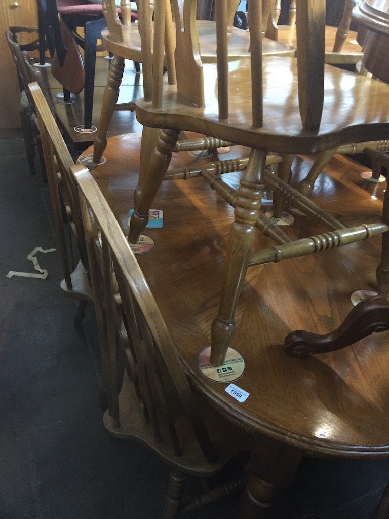 An American style extending dining table Live bidding available via our website, if you require P&