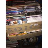 4 boxes of DVDs Live bidding available via our website, if you require P&P please read important