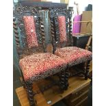 A pair of carved oak and upholstered high back chairs, h99cm. Live bidding available via our