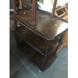 An oak trolley and a reproduction drum table Live bidding available via our website, if you