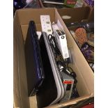 A box of misc electrical items to include 2 laptops as found, no hard drives, gang plug, and a