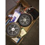 A pair of sack truck wheels, battery charger, button batteries etc Live bidding available via our