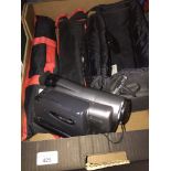 A Sanyo handy cam in case and two tripods Live bidding available via our website, if you require P&P