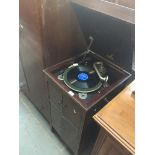 A vintage Academy gramophone in cabinet with no.8519 sound box. Live bidding available via our
