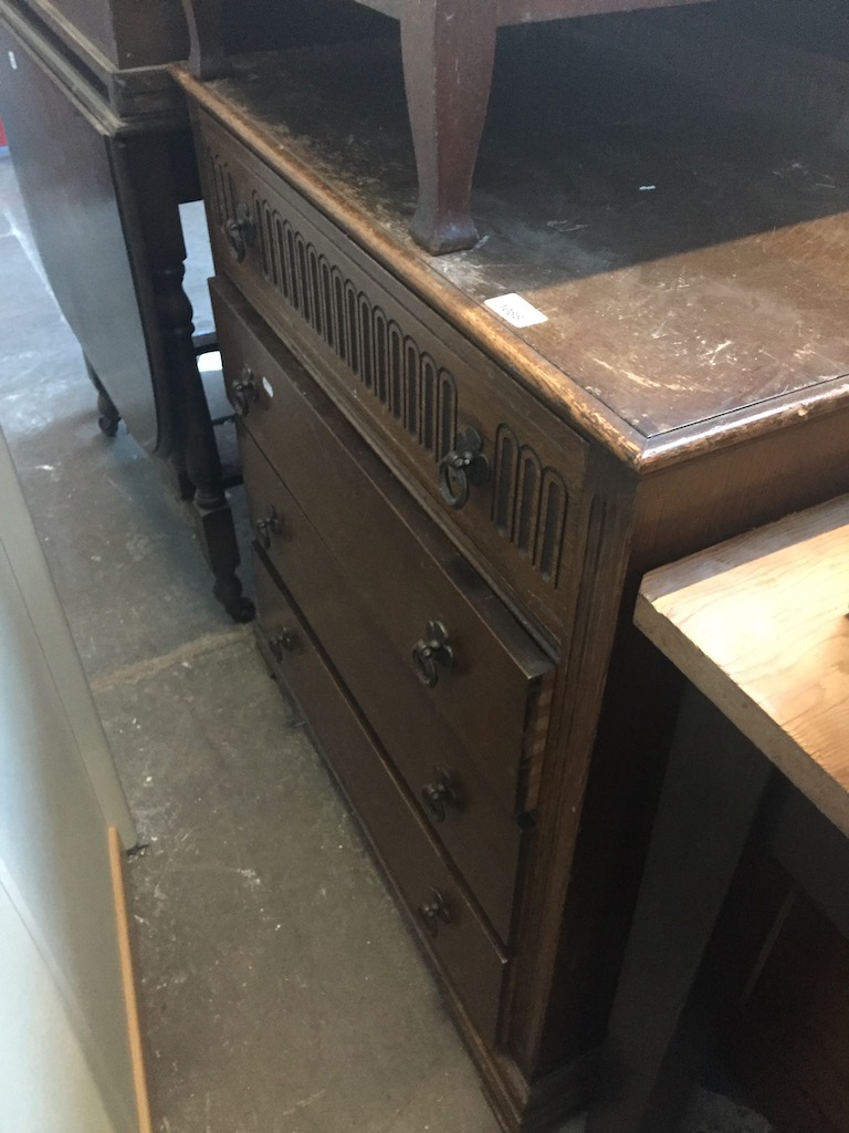 An oak chest of drawers Live bidding available via our website, if you require P&P please read