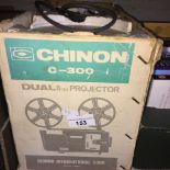 A Chinon cine projector Live bidding available via our website, if you require P&P please read