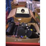 A box of cameras and a Gnome projector Live bidding available via our website, if you require P&P