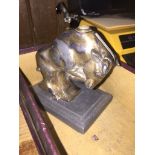 A cast metal bull match striker on plinth Live bidding available via our website, if you require P&P