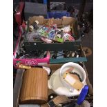 A table top comprising 8 boxes, containing tools, plumbing wares, household cleaning items,